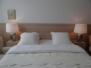 Posteľ alebo postele v izbe v ubytovaní Boutique Aparthotel