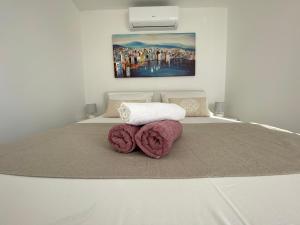 Posteľ alebo postele v izbe v ubytovaní Apartmani Vujić- Villa Dolac