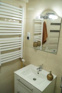 Kúpeľňa v ubytovaní Apartament Nałęczów dom pod orzechami