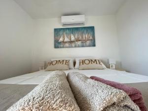 Posteľ alebo postele v izbe v ubytovaní Apartmani Vujić- Villa Dolac