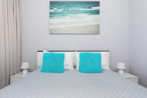 Łóżko lub łóżka w pokoju w obiekcie Apartos Sailor - Luxury Apartments