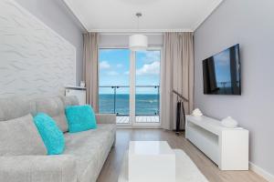 Telewizja i/lub zestaw kina domowego w obiekcie Apartos Sailor - Luxury Apartments