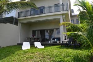 Zahrada ubytování Villa du Lagon