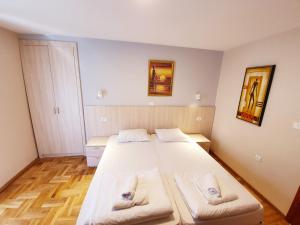 Krevet ili kreveti u jedinici u okviru objekta Apartments Pier