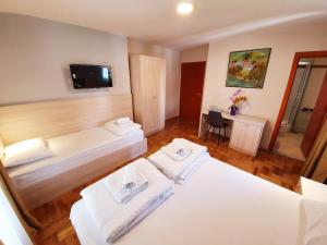 Krevet ili kreveti u jedinici u okviru objekta Apartments Pier
