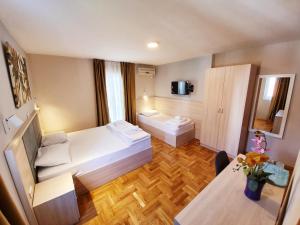 Krevet ili kreveti u jedinici u okviru objekta Apartments Pier