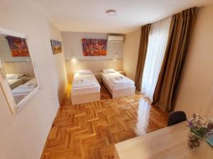 Krevet ili kreveti u jedinici u okviru objekta Apartments Pier