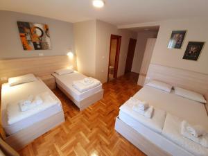 Krevet ili kreveti u jedinici u okviru objekta Apartments Pier