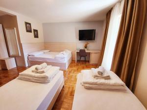 Krevet ili kreveti u jedinici u okviru objekta Apartments Pier