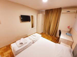 Krevet ili kreveti u jedinici u okviru objekta Apartments Pier