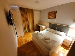 Krevet ili kreveti u jedinici u okviru objekta Apartments Pier