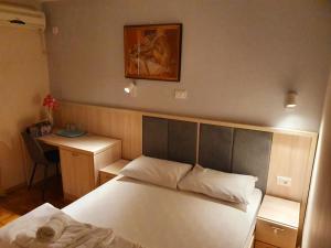 Krevet ili kreveti u jedinici u okviru objekta Apartments Pier