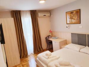 Krevet ili kreveti u jedinici u okviru objekta Apartments Pier