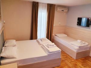 Krevet ili kreveti u jedinici u okviru objekta Apartments Pier