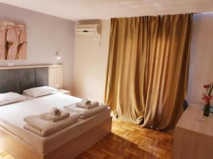 Krevet ili kreveti u jedinici u okviru objekta Apartments Pier