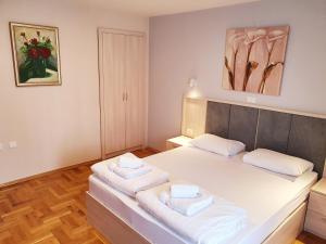 Krevet ili kreveti u jedinici u okviru objekta Apartments Pier