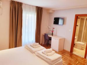 Krevet ili kreveti u jedinici u okviru objekta Apartments Pier