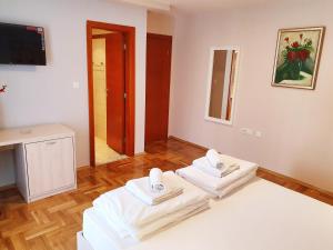 Krevet ili kreveti u jedinici u okviru objekta Apartments Pier
