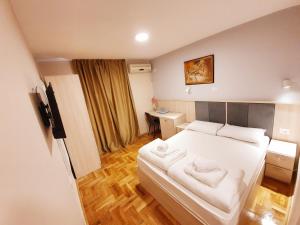 Krevet ili kreveti u jedinici u okviru objekta Apartments Pier
