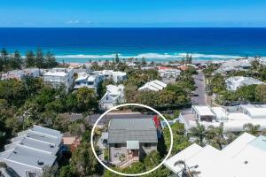 an aerial view of a house in a suburb at Crystal Shores Sunshine Beach in Sunshine Beach