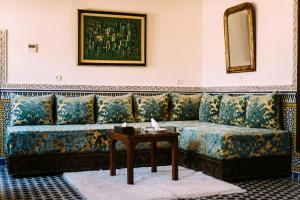 Posezení v ubytování La Maison Bleue Batha