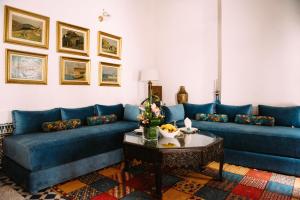 Posezení v ubytování La Maison Bleue Batha