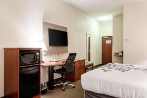 A television and/or entertainment centre at Sleep Inn & Suites