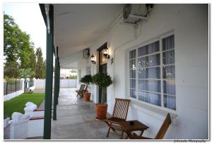 Balkón nebo terasa v ubytování Victorian Square Guesthouse