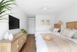 Postel nebo postele na pokoji v ubytování Loea Boutique Hotel