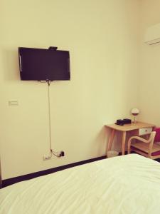 Televisi dan/atau pusat hiburan di 星海芝家民宿Samuel's Home