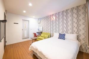 Katil atau katil-katil dalam bilik di Luodong Nightmarket Homestay