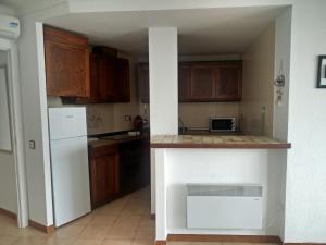 Kuchyňa alebo kuchynka v ubytovaní APARTAMENT AL PORT EmpuriaRent