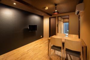 TV a/nebo společenská místnost v ubytování Kanade Inari-Sandomae