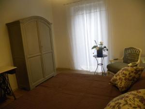 Llit o llits en una habitació de Corte Del Gallo