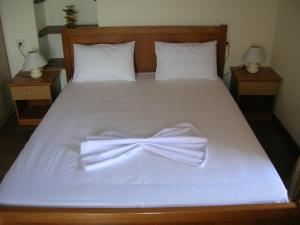 Llit o llits en una habitació de Villa Kastri