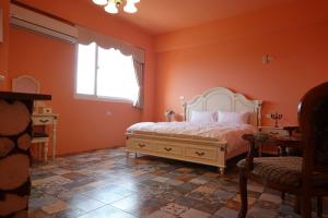 Postel nebo postele na pokoji v ubytování Provence Homestay