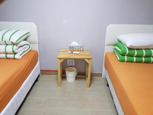 Postel nebo postele na pokoji v ubytování K Guesthouse