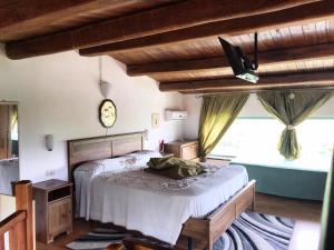 Säng eller sängar i ett rum på Villa paradiso