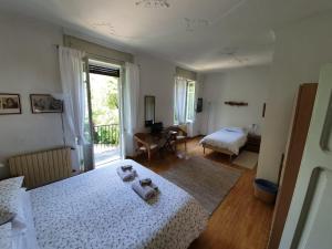 Postel nebo postele na pokoji v ubytování B&B I Ghiri