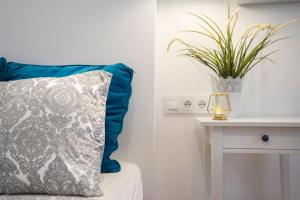 Postel nebo postele na pokoji v ubytování Hotelito Boutique Cinca