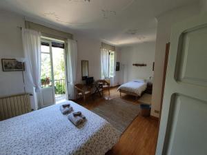 Postel nebo postele na pokoji v ubytování B&B I Ghiri