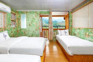 Letto o letti in una camera di 龙胜馨嘉源饭店