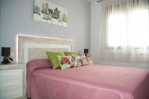 Posteľ alebo postele v izbe v ubytovaní Apartamentos EL POSAERO Juan Mariano