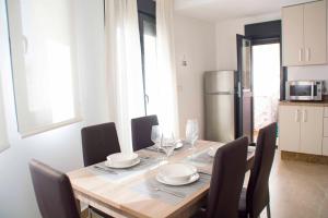 Kuchyňa alebo kuchynka v ubytovaní Apartamentos EL POSAERO Juan Mariano