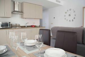 Kuchyňa alebo kuchynka v ubytovaní Apartamentos EL POSAERO Juan Mariano