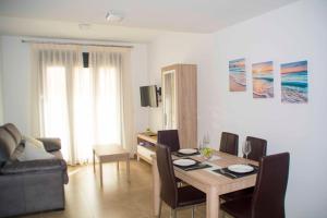 Posedenie v ubytovaní Apartamentos EL POSAERO Juan Mariano