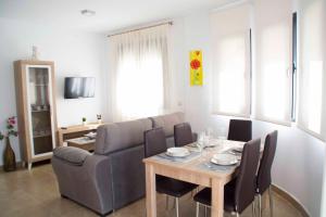 Posedenie v ubytovaní Apartamentos EL POSAERO Juan Mariano