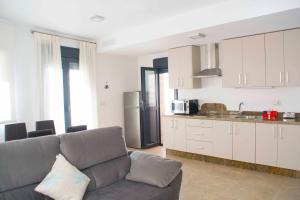 Kuchyňa alebo kuchynka v ubytovaní Apartamentos EL POSAERO Juan Mariano