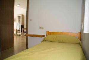 Posteľ alebo postele v izbe v ubytovaní Apartamentos EL POSAERO Juan Mariano