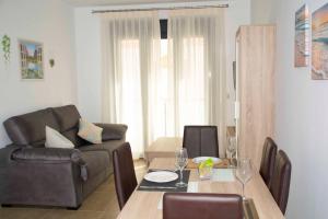 Posedenie v ubytovaní Apartamentos EL POSAERO Juan Mariano